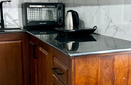 Kochchikade Apartment | Palmwood Cottages Double Bed Room with Kitchen