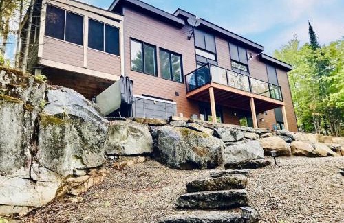 Chertsey House | Panoramic Lakefront Chalet with Hot Tub & Firepit