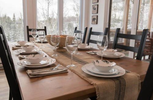 Chertsey House | Panoramic Lakefront Chalet with Hot Tub & Firepit
