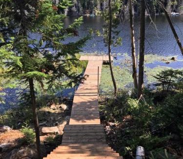 Chertsey House | Panoramic Lakefront Chalet with Hot Tub & Firepit