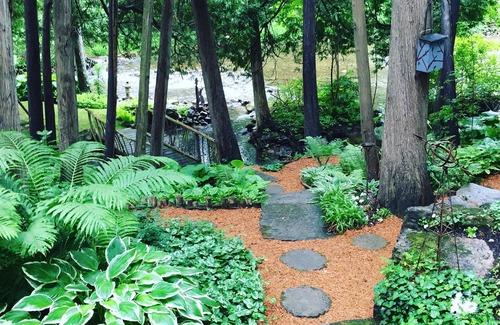 Caledon House | PARADISE OVERLOOKING THE BUBBLING CREDIT RIVER SURRONDED BY LUSH MATURE GARDENS