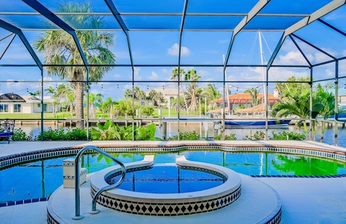 Edgewater House | Paradise Palms | House in Port Charlotte with water views, pool & pool spa