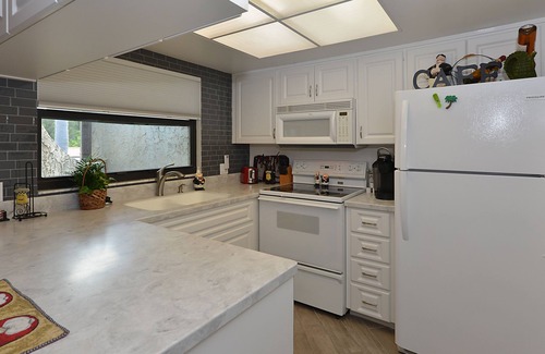 Palm Harbor Condo | "Paradise" Waterfront Condo with 19' Boat