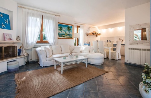 Capalbio House | Part of a semi-detached house with private pool in the residential area of Capalbio Scalo, not far f