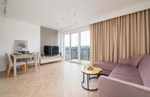Zywiec Apartment | Pastel Apartment with Balcony and Parking by Noclegi Renters