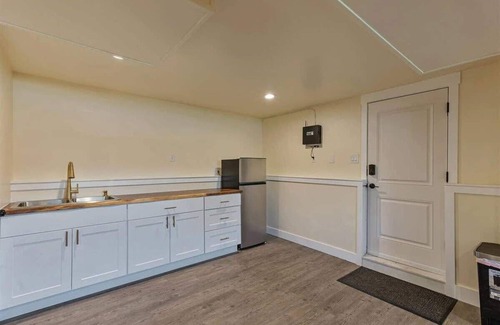 Sandy House | Patio, Parks Close By, Half Basketball Court