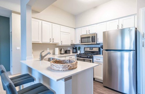McNeil Apartment | Peaceful 1BR King Suite | Pool, Parking + Gym 02