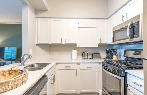 McNeil Apartment | Peaceful 1BR King Suite | Pool, Parking + Gym 02