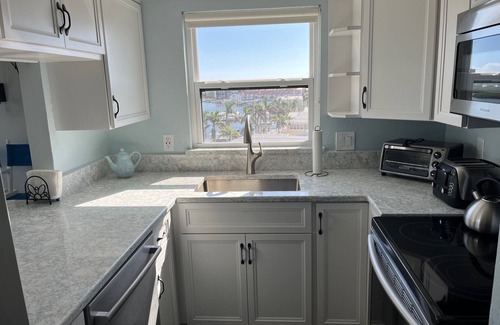 Indian Shores Condo | 🐬🌞PEACEFUL 6th FL END UNIT ON THE INTRACOASTAL W/GULF VIEWS at BAY SHORES🌞🐬