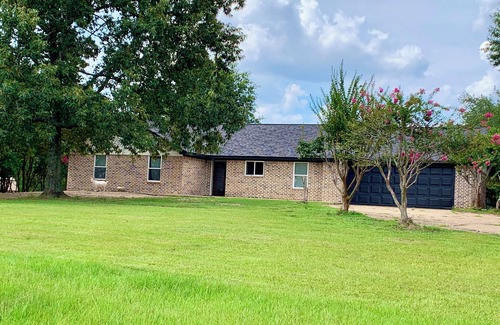 Long Branch House | Peaceful country cottage surrounded by a 1000 acre of heavily wooded area.