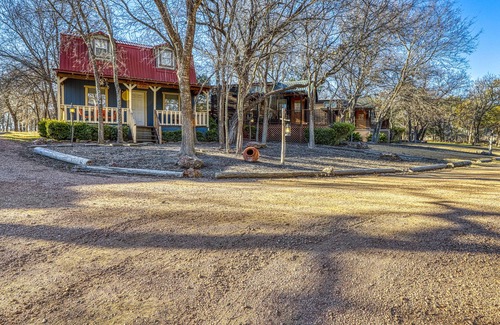 Fredericksburg Cabin | Peaceful, family-friendly cabin w/ playground, firepit, & shared hot tub!
