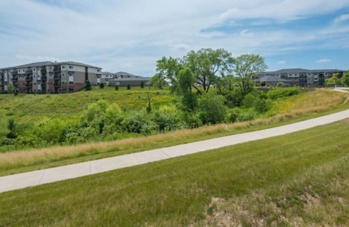 West Des Moines Apartment | Peaceful Getaway-Pool Access, Attached Garage, Gym