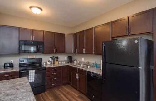 West Des Moines Apartment | Peaceful Getaway-Pool Access, Attached Garage, Gym