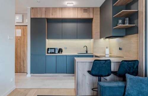 Srodmiescie Apartment | Peaceful Horizon Łódź by Aparo - Nowy Apartament, Winda, Łóżeczko Turystyczne, Balkon, 5 Piętro, Szpital CKD, Uniwersytet