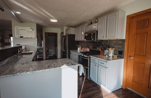Kearney House | Peaceful neighborhood OUTSIDE of Kearney and one of the LARGEST homes available.