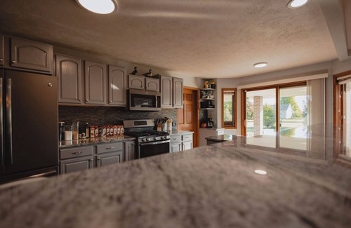Kearney House | Peaceful neighborhood OUTSIDE of Kearney and one of the LARGEST homes available.