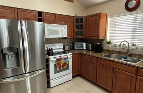 Town 'n' Country House | Peaceful Pool Home Near Airport Heated pool