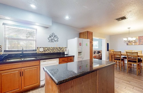 River Side Village House | Peaceful & sun-soaked home with yard & screened patio - dog-friendly - near golf
