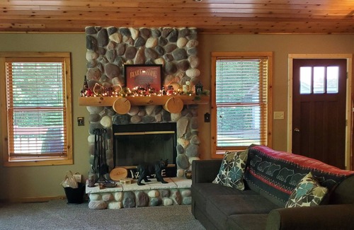 Iron River House | Peaceful Wooded Retreat Offering Immediate Access to all Trails and Area Lakes!