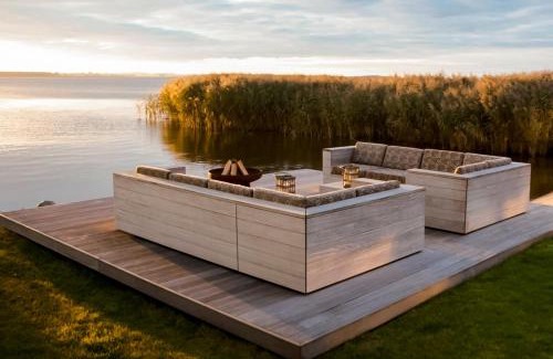 Rankwitz House | Peeneblick - Traumhaus in exklusiver Direktlage am Wasser mit eigenem Bootssteg für 8 Personen
