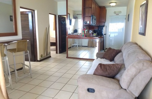 Puntas Condo | Pelican Point BEACHFRONT Apt C Centered on the famous Sandy Beach Surf