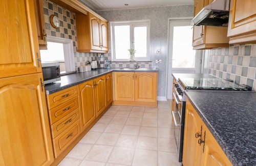 Brynteg House | PEN BRYN, with open fire in Benllech
