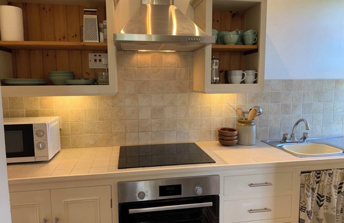 Cylch-Y-Garn Cottage | Pen y Graig - Front Wing, Church Bay, sea views, 500m to beach.