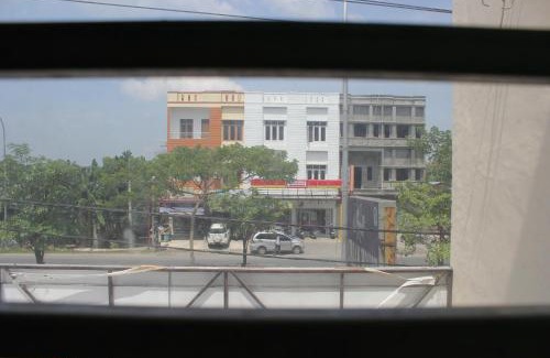 Medan House | Penginapan Transit Tomato
