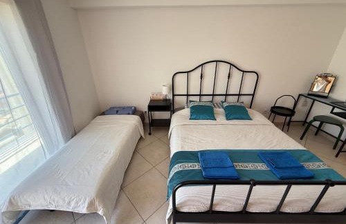 Sao Bernardino House | Peniche master bedroom with sea view balcony, private bathroom, shared kitchen, swimming pool, surfing resort