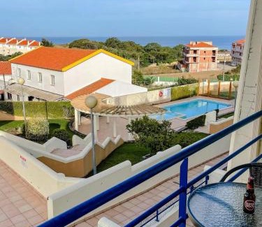 Sao Bernardino House | Peniche master bedroom with sea view balcony, private bathroom, shared kitchen, swimming pool, surfing resort