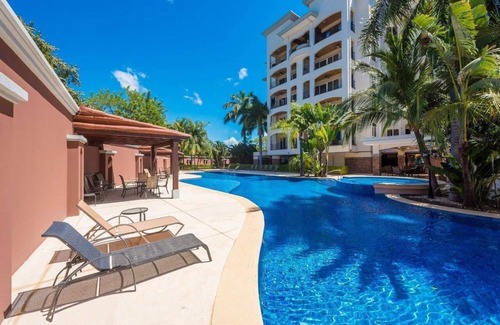 Playa Langosta Apartment | Peninsula 9 ⛱ Tropical Lux ⛱ 2Bdr condo⛱ Pool view⛱ At the Beach ⛱ Playground