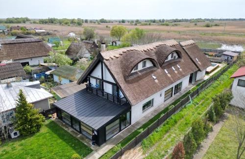 Crisan House | Pensiunea Pescarul Vanator Delta Dunarii