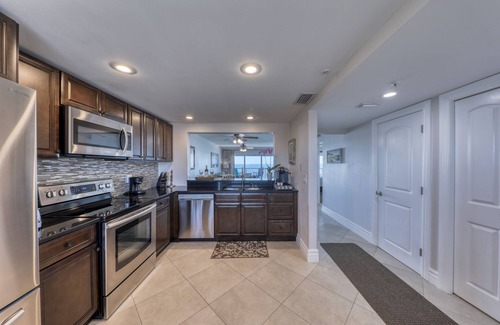 Madeira Beach Condo | Penthouse Beachfront Luxury Condo 30’ft balcony and Gulf Views @OceanSands1203