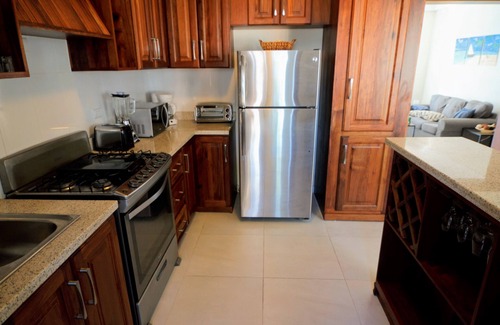 El Cortecito Condo | Penthouse Condo/Private roof deck. Steps to the Beach! -WiFi and Cable TV