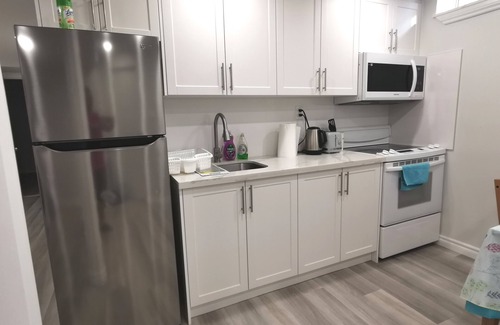 Hurontario House | Perfect location comfort lower level 2 bedroom unit