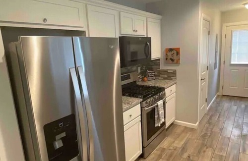 Stillwater House | Perfect Oasis. NEW Home Away from Home with COVERED PARKING-Close to everything