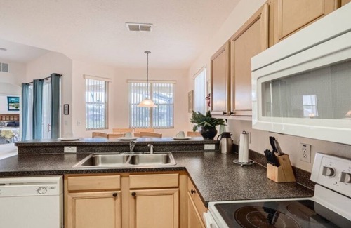 Haines City Villa | Perfect Pool Time Villa in Calabay Parc | Garage Game Room| Community Lake