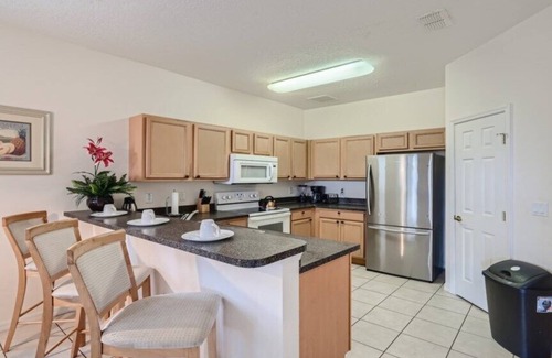 Haines City Villa | Perfect Pool Time Villa in Calabay Parc | Garage Game Room| Community Lake