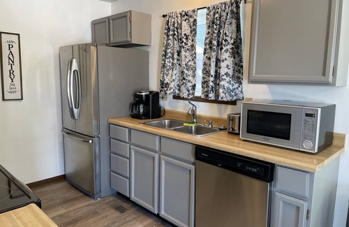 Sheridan House | Pet Friendly 3 bedroom home near hospital, walking paths, Large fenced Backyard