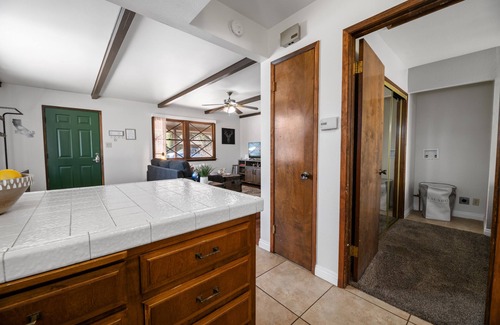 Woodlands House | Pet friendly cabin with fireplace and fenced yard