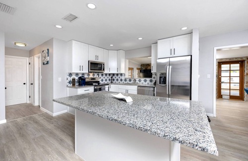 Largo House | Pet Friendly home with a heated Pool in Quiet Residential Area ~ Short Drive to Beach! ~ Blue Lagoon
