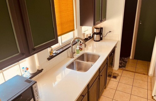 North Park Hill House | Pet Friendly Retro Oasis in Central Park/Park Hill. 2 bd w/dedicated work space