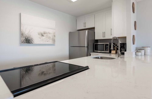 Avon By The Sea Condo | Pier-Side Penthouse Spacious Corner Unit W/Heated Pool & BBQ Grills! 🌴