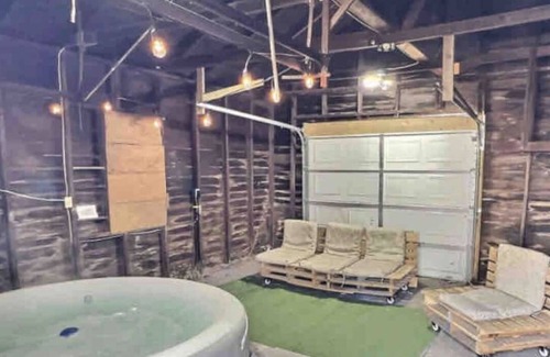 Cedar Rapids House | Pine Home with Hot Tub
