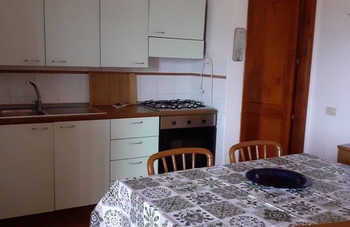 Aglientu Apartment | Pink house in residence with pool, wifi -air conditioner, near the sea