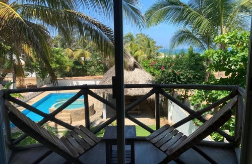 Brisas de Zicatela Apartment | Playa Bruja Zicatela Apt. 3, Beach Front, Kitchen, AC, Starlink, Pool & More
