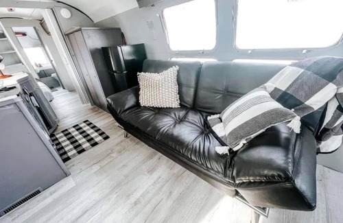 Graford House | Playin Hookie! Vintage Airstream pulled by Panel Wagon/ converted to a bedroom.