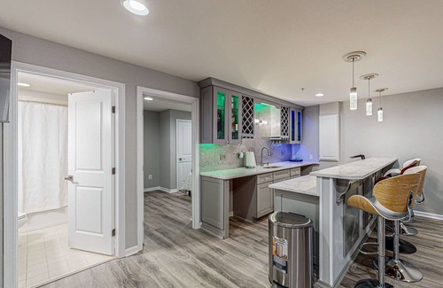 Waldorf House | Pleasant White Plains home with in-home gym, game tables, & jetted tub