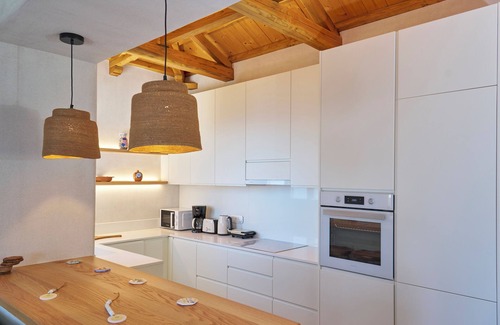 Skopelos Villa | Pnoé Residence is an elegant and modern home that has been fully renovated