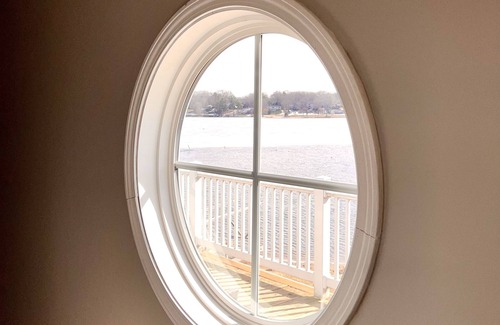 Norton Shores House | PONTOON BOAT NOW INCLUDED! 7 BEDS, HOT TUB Updated Lakefront Cottage - Book Now
